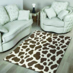 Brown And White Cow Print Sillvela Area Rug
